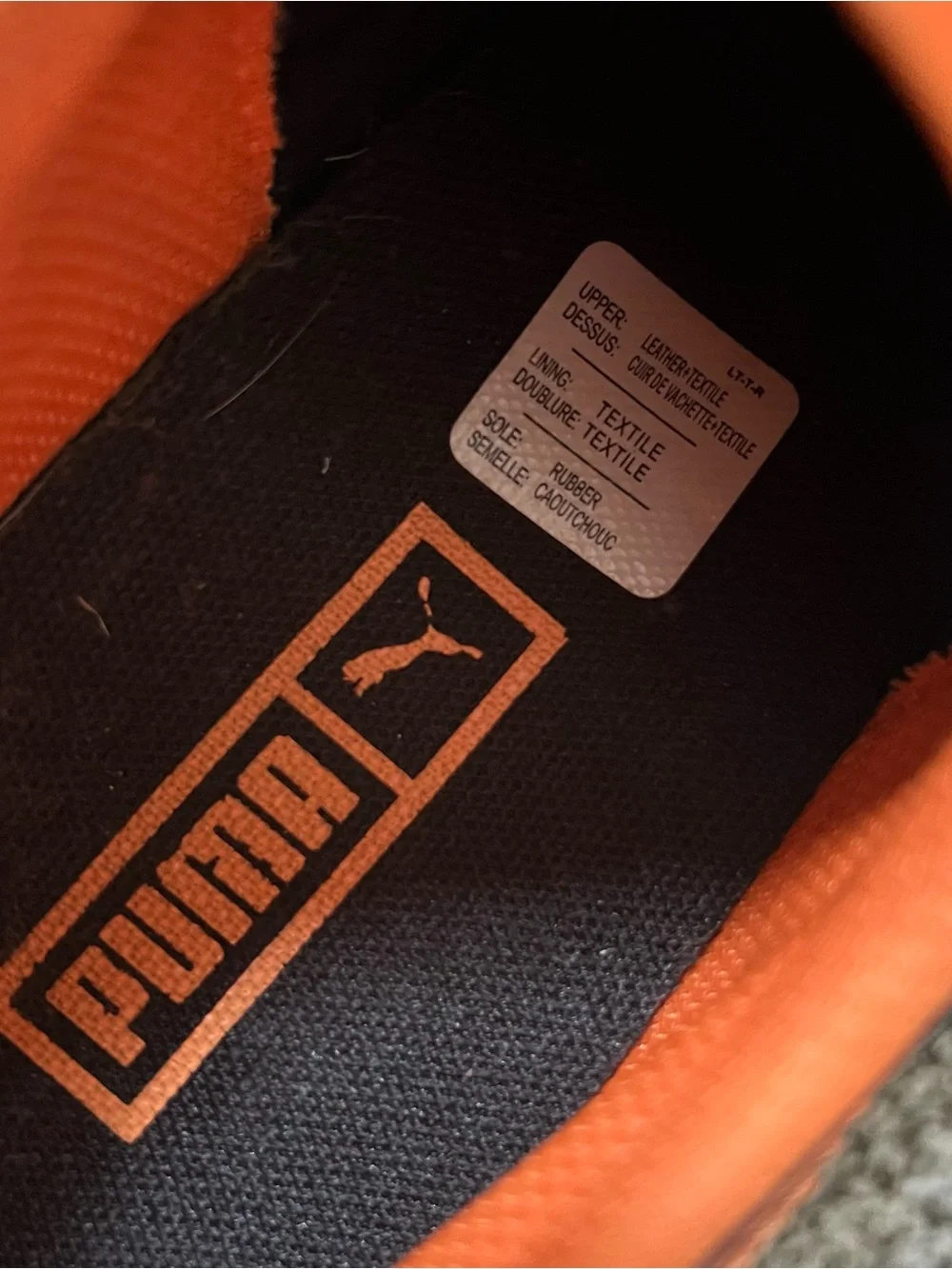 Puma Black and Bright Orange Fast Rider sneakers size 10.5 men’s